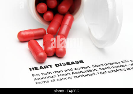 Heart disease text with pills Stock Photo
