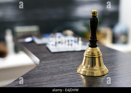 Bell on reception desk Stock Photo