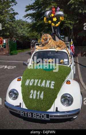 1972 Classic vintage VW Volkswagen Beetle car decorated for the Open Golf at Hoylake, with tiger soft toy on the roof, and a lawned bonnet, Wirral, UK Stock Photo
