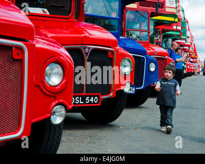 London, UK. 13th July 2014. Finsbury Park, North London plays host to the Routemaster Bus Festival, commemorating the 60th anniversary of the unveiling of the first Routemaster. The event is run by the Routemaster Association, with over 100 vehicles on display Credit:  Paul Swinney/Alamy Live News Stock Photo