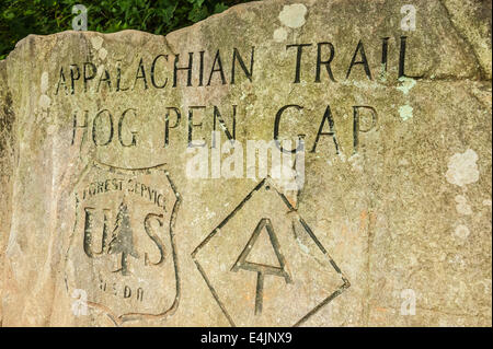 Stone marker where the Appalachian Trail meets the Richard B. Russell Scenic Highway at Hog Pen Gap in North Georgia, USA.