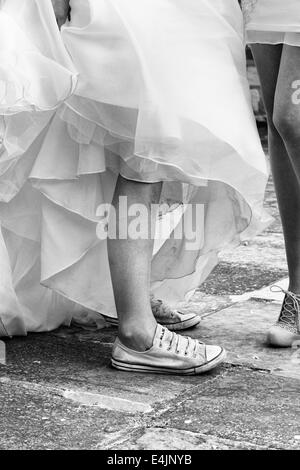 bride with trainers