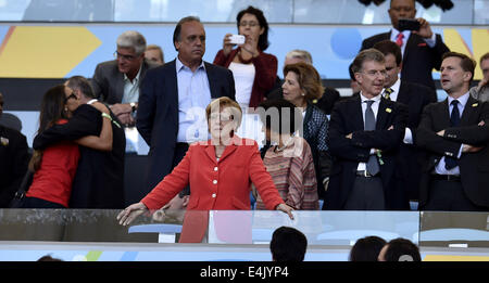 Rio De Janeiro, Brazil. 13th July, 2014. German Chancellor Angela Merkel (front) watches the final match between Germany and Argentina of 2014 FIFA World Cup at the Estadio do Maracana Stadium in Rio de Janeiro, Brazil, on July 13, 2014. Credit:  Qi Heng/Xinhua/Alamy Live News Stock Photo