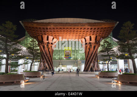 Night view of huge wooden gate marking the entrance to Kanazawa JR Station Building, Kanazawa, Japan Stock Photo
