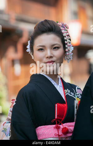 Young woman dressed in kimono in historically preserved Higashi Chaya district of Kanazawa Stock Photo