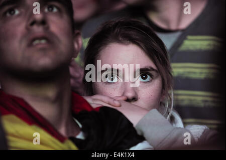 Freiburg, Germany. 13th July, 2014. Football fans at a large public viewing area in Freiburg watch Germany play Argentina in the final of the FIFA World Cup 2014. Photo: Miroslav Dakov/ Alamy Live News Stock Photo