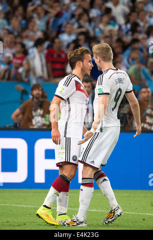 (L-R) Mario Gotze, Andre Schurrle (GER), JULY 13, 2014 - Football / Soccer : Mario Gotze of Germany celebrates after scoring his side first goal during the FIFA World Cup Brazil 2014 Final match between Germany 1-0 Argentina at the Maracana stadium in Rio de Janeiro, Brazil. (Photo by Maurizio Borsari/AFLO) Stock Photo