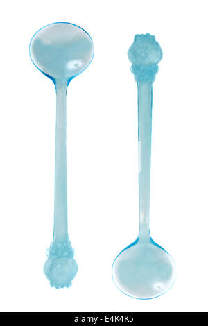 Two blue transparent plastic spoons Stock Photo