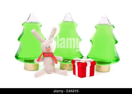Knitted rabbit and a red box gifts Stock Photo