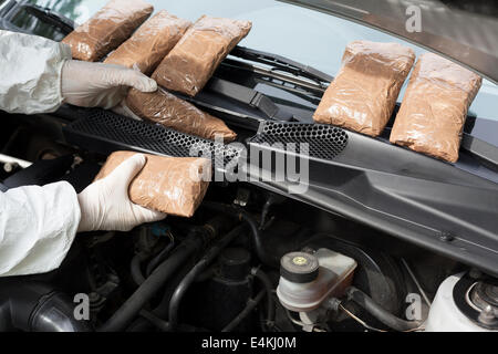 hidden drugs in a vehicle compartment Stock Photo