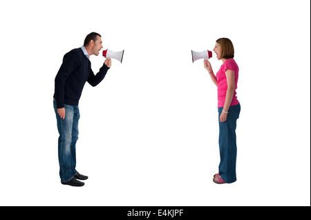 man and woman arguing using megaphone bullhorn isolated on white - conflict concept Stock Photo