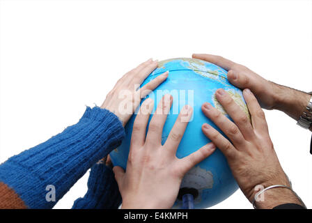 Teamwok concept with hands on globe Stock Photo