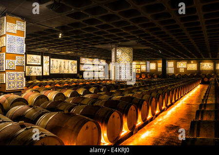 Wine barrels in a cellar decorated with antique azulejos, Bacalhoa Winery, Azeitao, Setubal Peninsula, Portugal, Europe Stock Photo