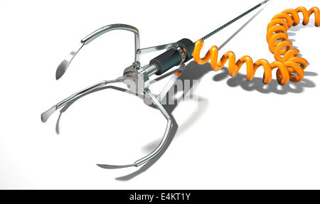An open metal robotic claw from an arcade type game connected to an orange coiled power cord laying down on an isolated white ba Stock Photo