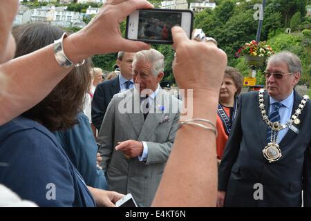 Looe, Cornwall, UK. 14th July, 2014. HRH Prince Charles, The Prince of Wales, also known as the Duke of Cornwall, and The Duchess of Cornwall tour Looe, where they meet members of the Royal National Lifeboat Institution and visit businesses affected by flooding earlier in the year. Looe, Cornwall, UK. 14th July, 2014. Credit:  Sean Hernon/Alamy Live News Stock Photo