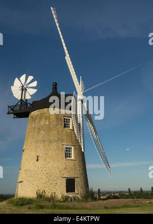 The windmill between Great Haseley and Great Milton England with a 'supermoon' and Didcot power station in the background Stock Photo