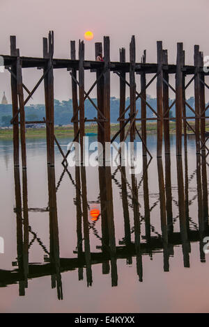 The U Bein Bridge spans across the Taungthaman Lake in Amarapura ...