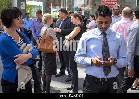 Melbourne Australia,Victoria CBD Central Business,District,William Street,office workers,outside building,during fire alarm,Asian Asians ethnic immigr Stock Photo