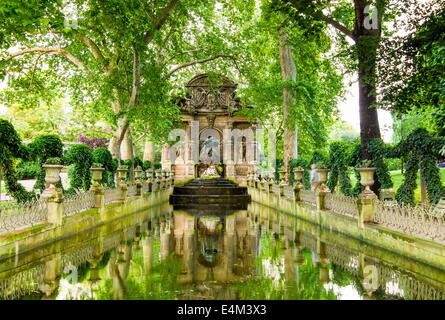 The Medici Fountain is a monumental fountain in the Jardin du Luxembourg in Paris Stock Photo