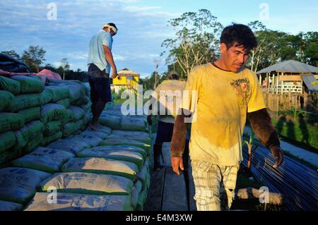 Cement downloading in Panguana. Department of Loreto .PERU Stock Photo