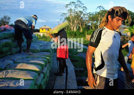 Cement downloading in Panguana. Department of Loreto .PERU Stock Photo