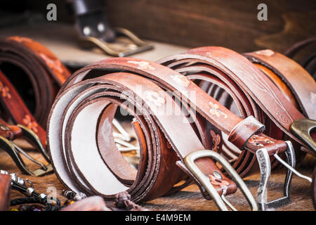 Store handmade  leather belts, spanish medieval fair Stock Photo