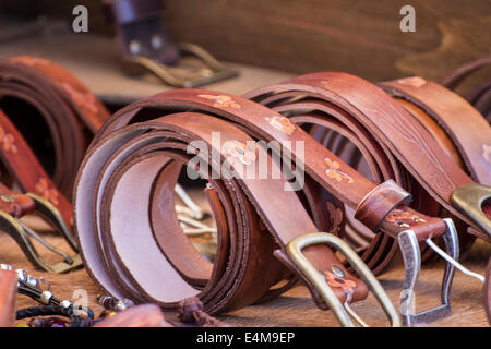 Store handmade  leather belts, spanish medieval fair Stock Photo