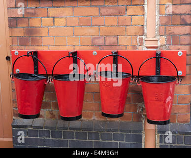 Fire buckets at Toddington Railway Station, Gloucestershire Stock Photo