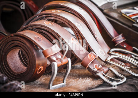 Store handmade  leather belts, spanish medieval fair Stock Photo