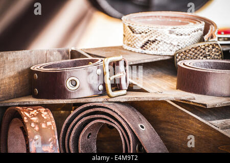 Store handmade  leather belts, spanish medieval fair, couro Stock Photo