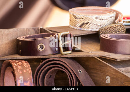 Store handmade  leather belts, spanish medieval fair, couro Stock Photo