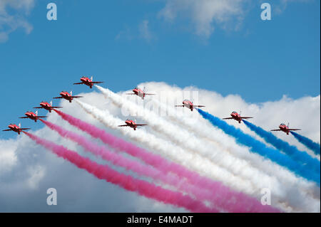 Farnborough, Hampshire, UK. 14th July, 2014. The Red Arrows perform during the Farnborough International Airshow's Media Day, on Monday July 14, 2014 Credit:  Heloise/Alamy Live News