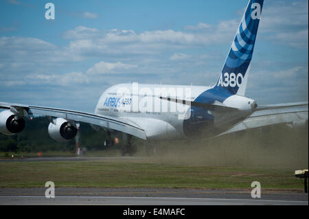 Farnborough, Hampshire, UK. 14th July, 2014. An Airbus A380 performs during the Farnborough International Airshow's Media Day, on Monday July 14, 2014 Credit:  Heloise/Alamy Live News