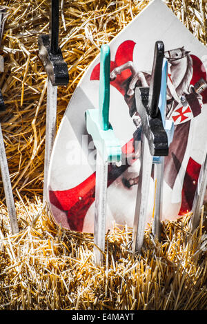 handmade wooden swords in a medieval fair Stock Photo