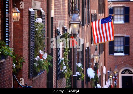 Beautiful Acorn Street in the historic Beacon Hill neighborhood of Boston, Massachusetts in winter with snow. Stock Photo