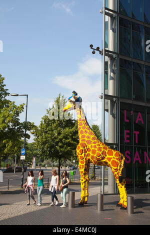 Germany, Berlin, Mitte, Potsdamer Platz, Model of Giraffe outside the Legoland Discovery Centre. Stock Photo