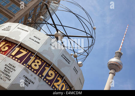 Germany, Berlin, Mitte, Alexanderplatz, the World Clock with Fernsehturm TV Tower behind. Stock Photo