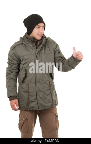 latin young man wearing green winter coat and a beanie Stock Photo