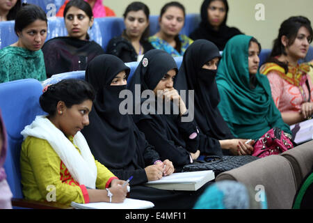 female students during a lecture at the female campus of the Islamic University, Islamabad, Pakistan Stock Photo