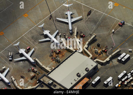 American Eagle planes and terminal at Los Angeles International Airport (LAX), Los Angeles, California, USA - aerial Stock Photo