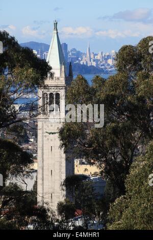 Sather Tower, also known at the Campanile, at the University of California at Berkeley, with San Francisco in the distance Stock Photo