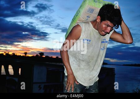 Cement downloading - Amazo river  in Panguana. Department of Loreto .PERU Stock Photo