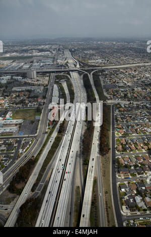 Interstate 405 near LAX, and interchange with I-105 in distance, Hawthorne, Los Angeles, California, USA - aerial Stock Photo