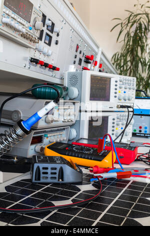 faulty solar regulator  on solar panel  checking using an oscilloscopes in laboratory Stock Photo