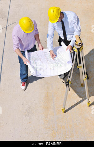 Team of architects on construciton site Stock Photo