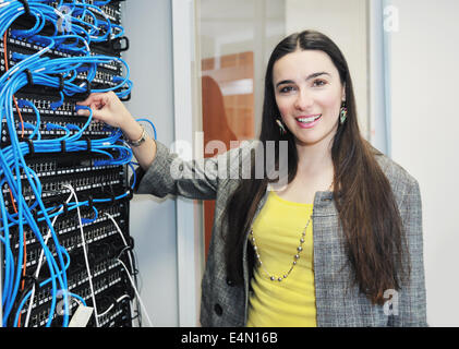 woman it engineer in network server room Stock Photo