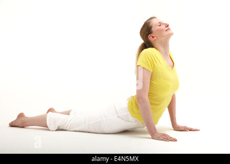 Woman doing push ups Stock Photo