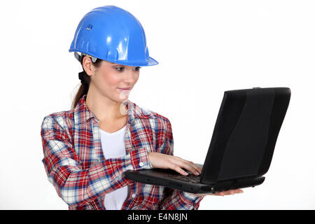 Female architect correcting designs Stock Photo