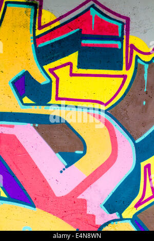 typography and color lines, segment of an urban grafitti on wall Stock Photo