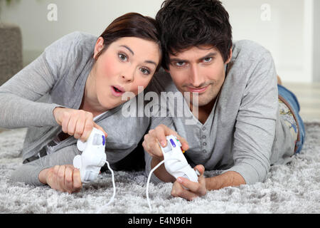 couple playing video games Stock Photo